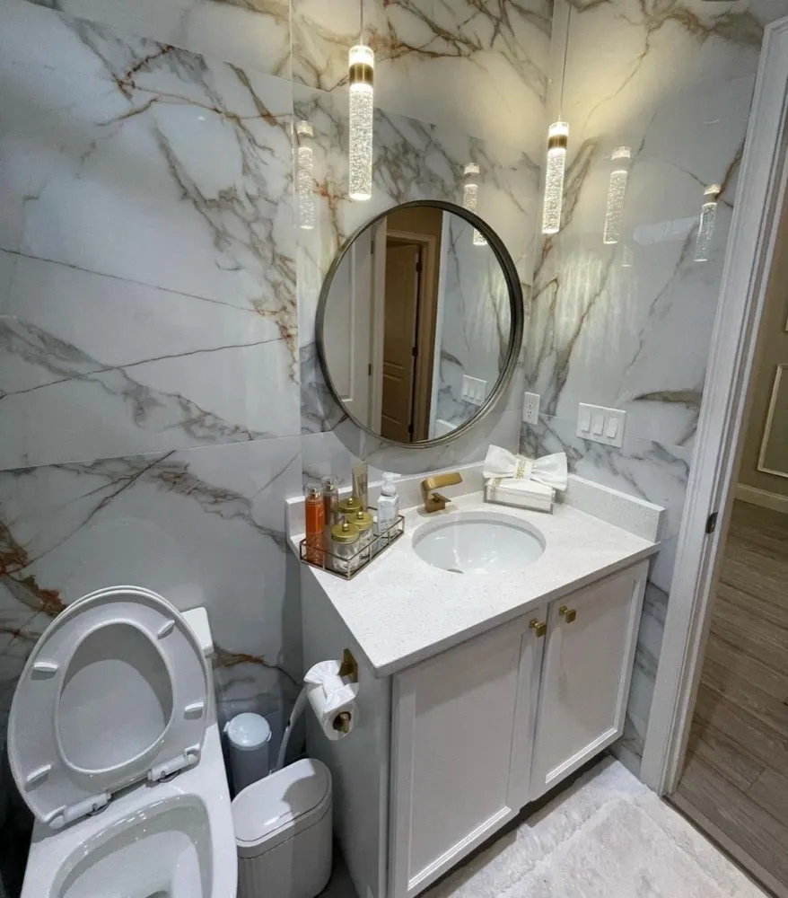 Marble powder room cleaned by the Quick Cleaning Services team in Maryland