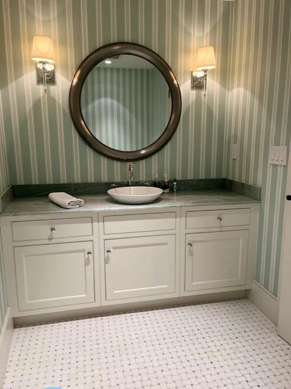 Guest powder room cleaned between short-term rental stays in Maryland