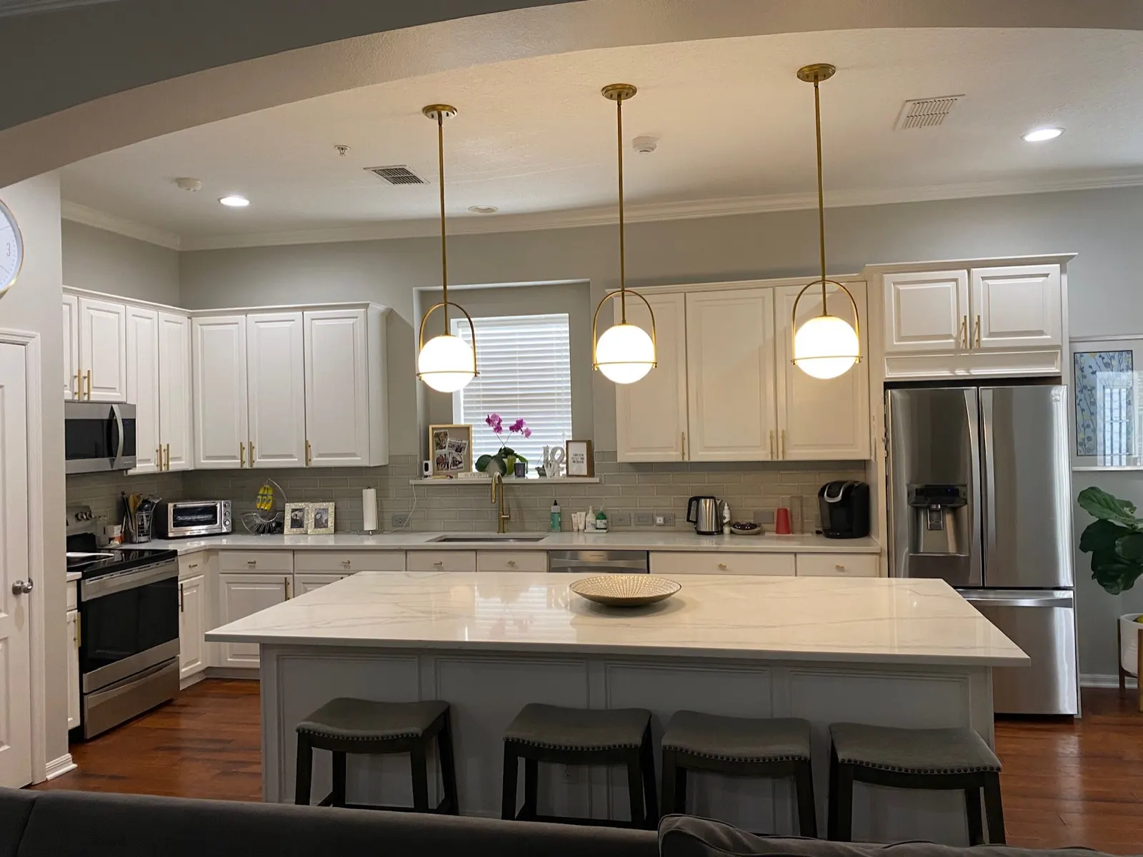 Kitchen island and shaker cabinets cleaned by Quick Cleaning Services in Maryland